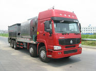Camión del mantenimiento de carreteras de la capacidad de la tolva de Sinotruk 14m3/equipo del revestimiento de carreteras